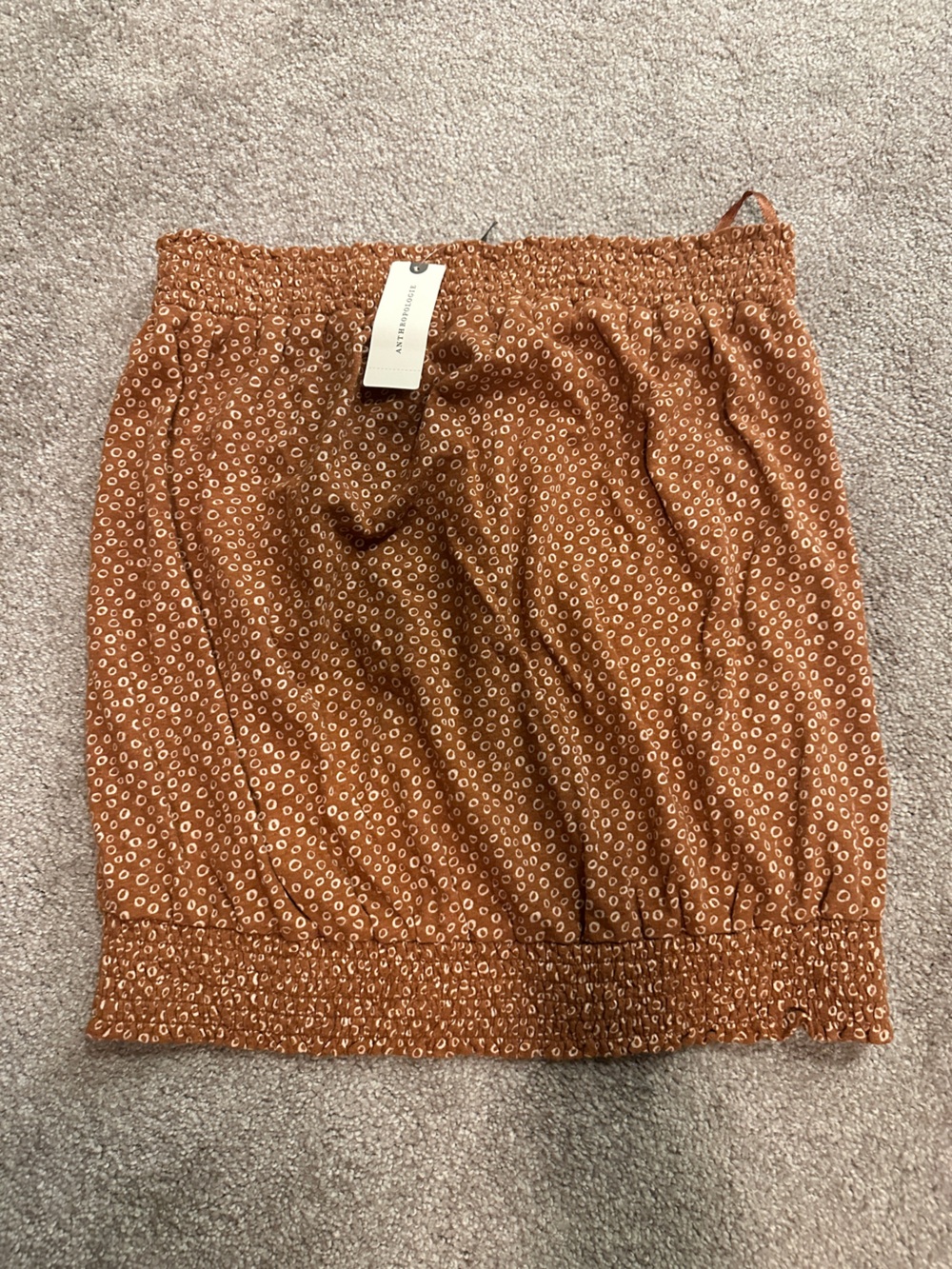Rust Printed Elastic tunic top by Anthropologie 
Size M
Never worn.